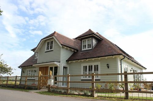 Hardie® Plank: Weatherboard in Soft Green upgrades Traditional Sussex styled home